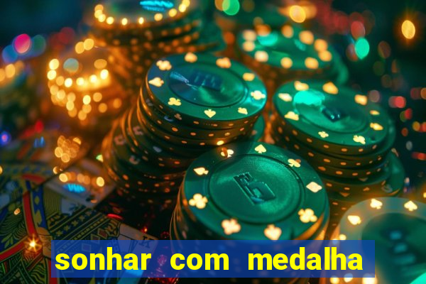 sonhar com medalha de santo