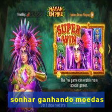 sonhar ganhando moedas